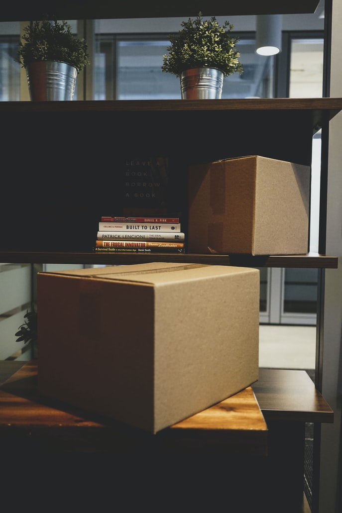 Boxes on bookshelf
