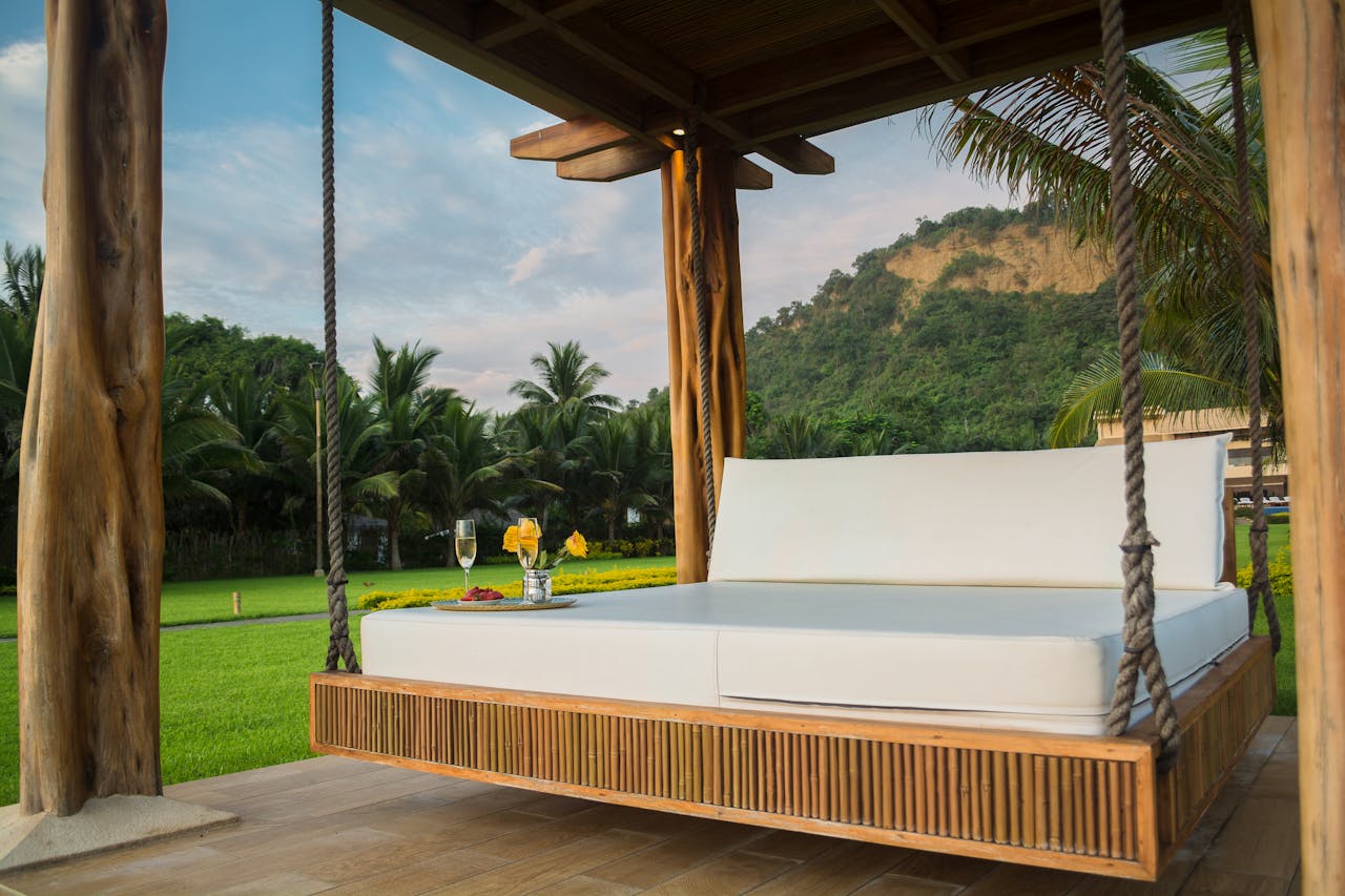 Bed swing, palm trees