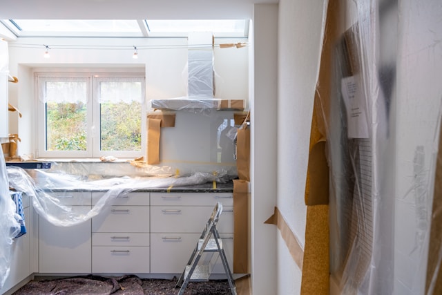 white kithcen prepared for paint