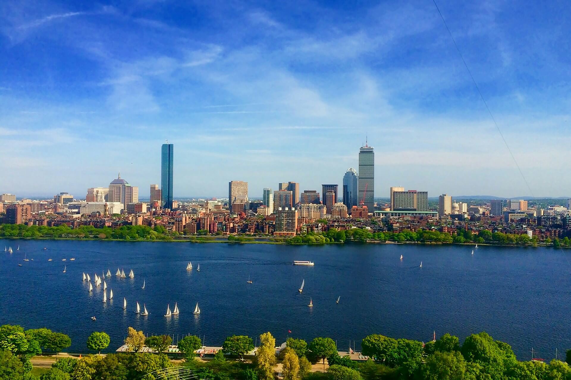 Boston skyline and waterfront representing the local home buying market. Image via Unsplash