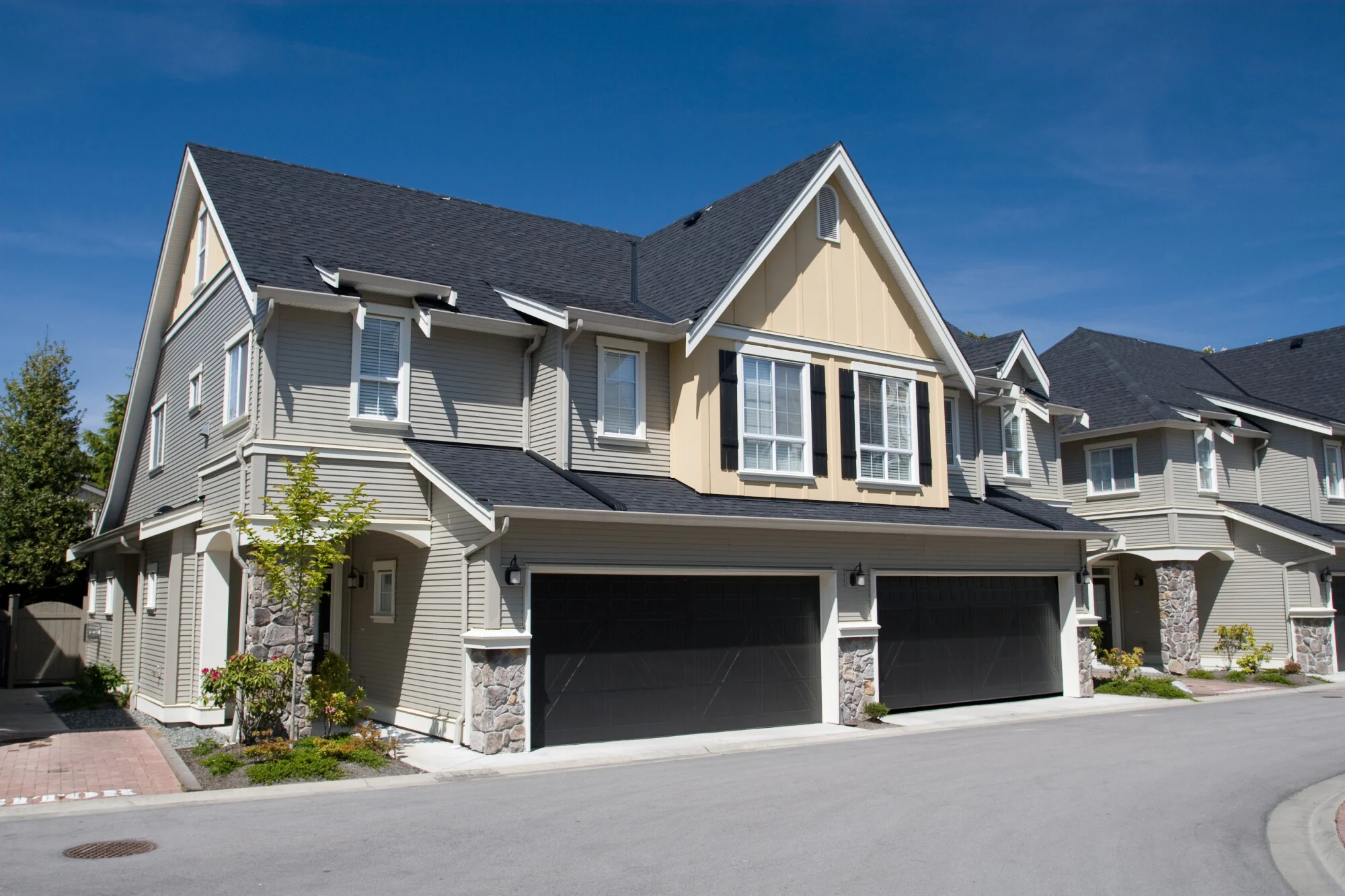 Modern houses, garage doors.