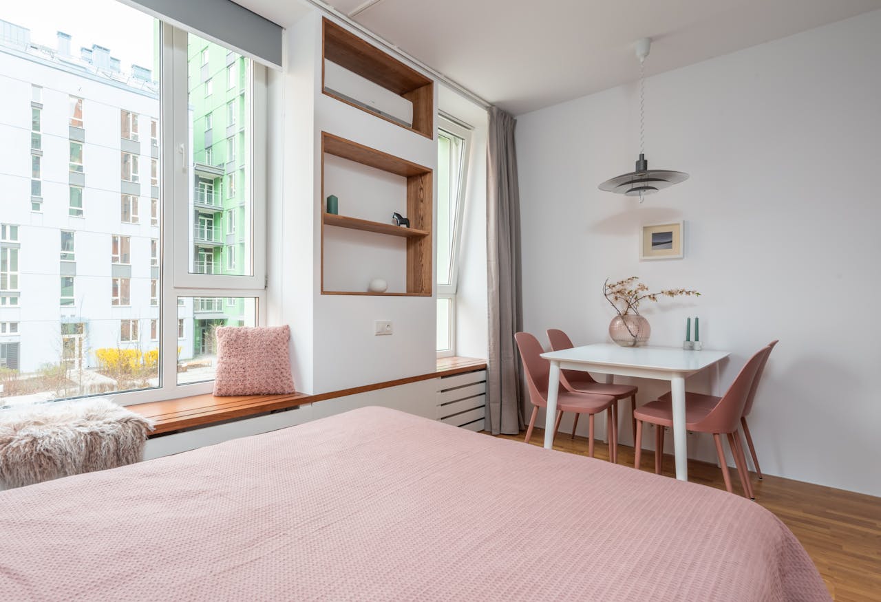 A predominantly pink living room. Image by Pexels