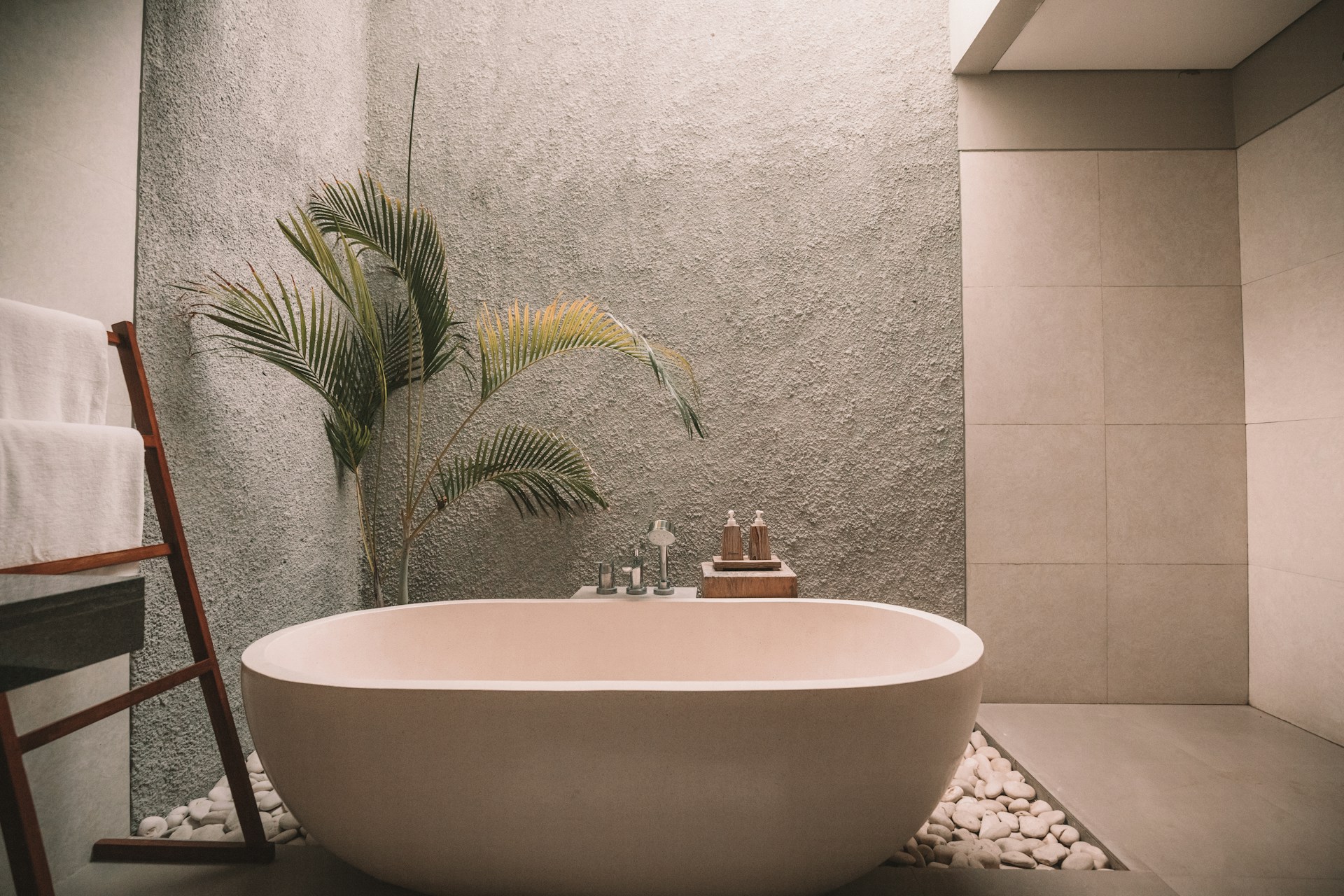 Modern bathroom with a freestanding bathtub. Image by Unsplash