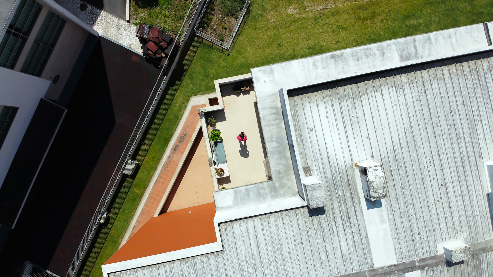 White and orange concrete buildings. Image by Unsplash