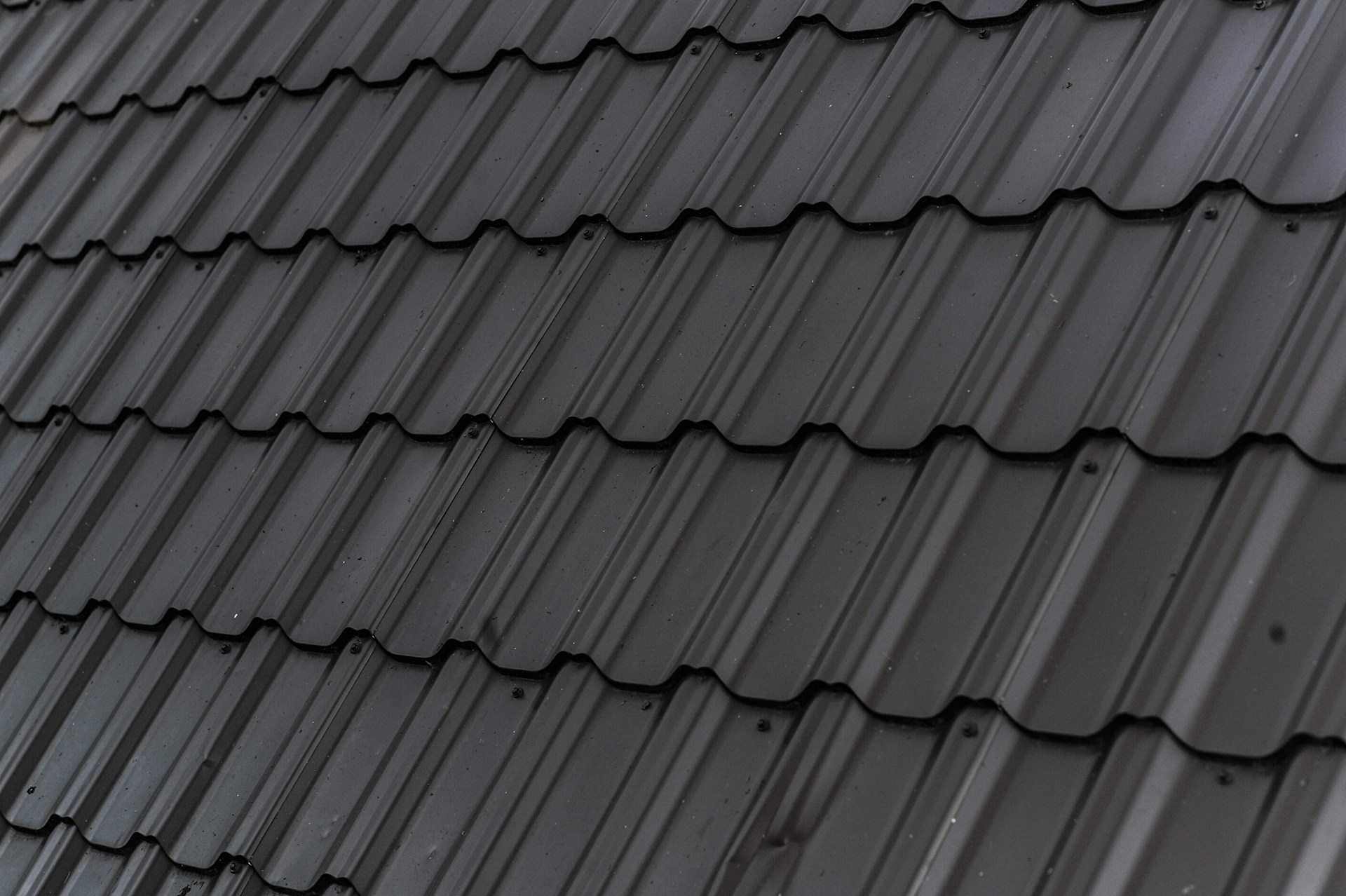 Black roof tiles. Image by Unsplash