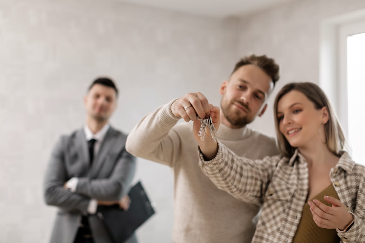 A couple holding their keys
