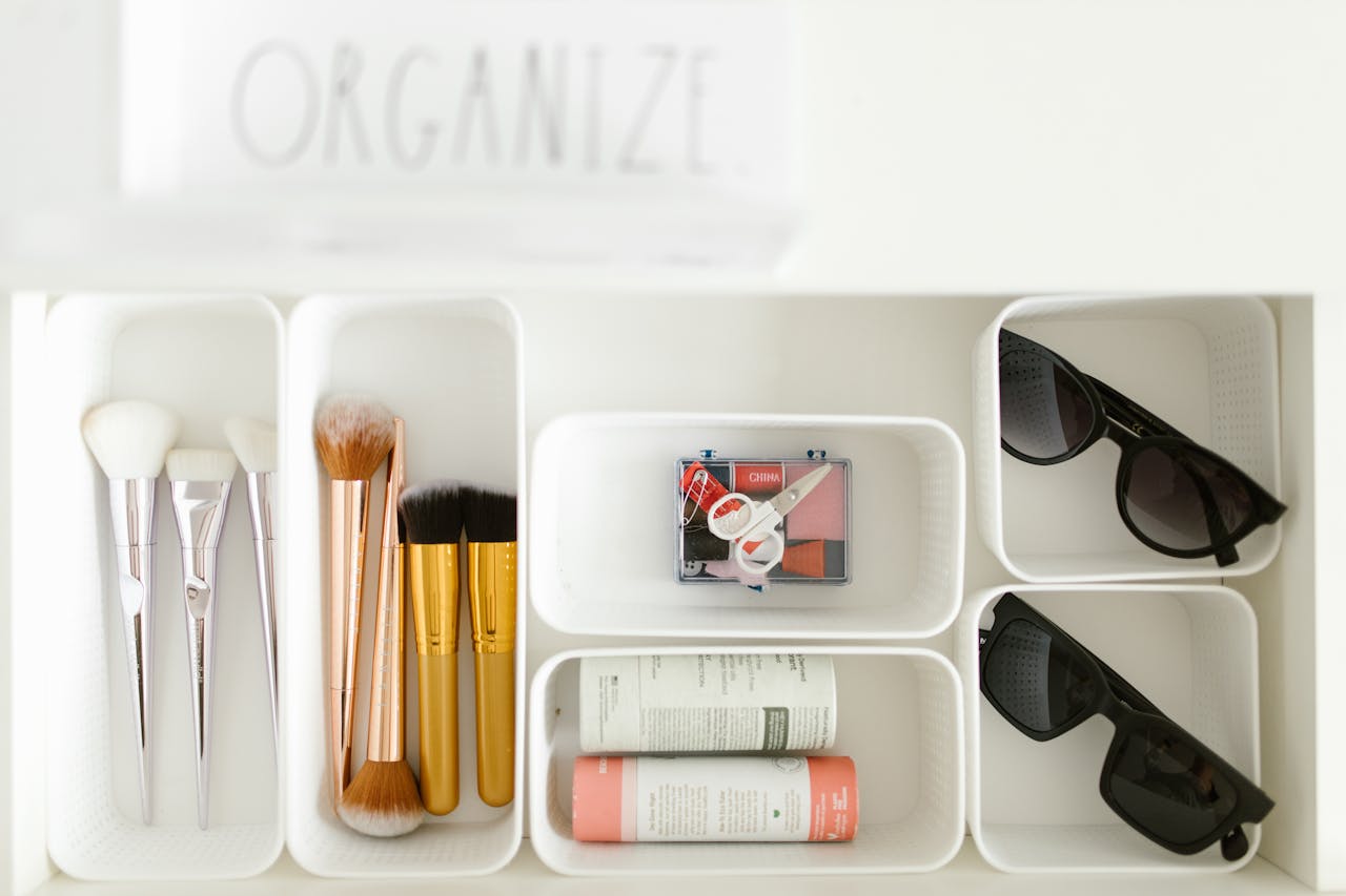 Boxes with sunglasses and accessories. Image by Pexels