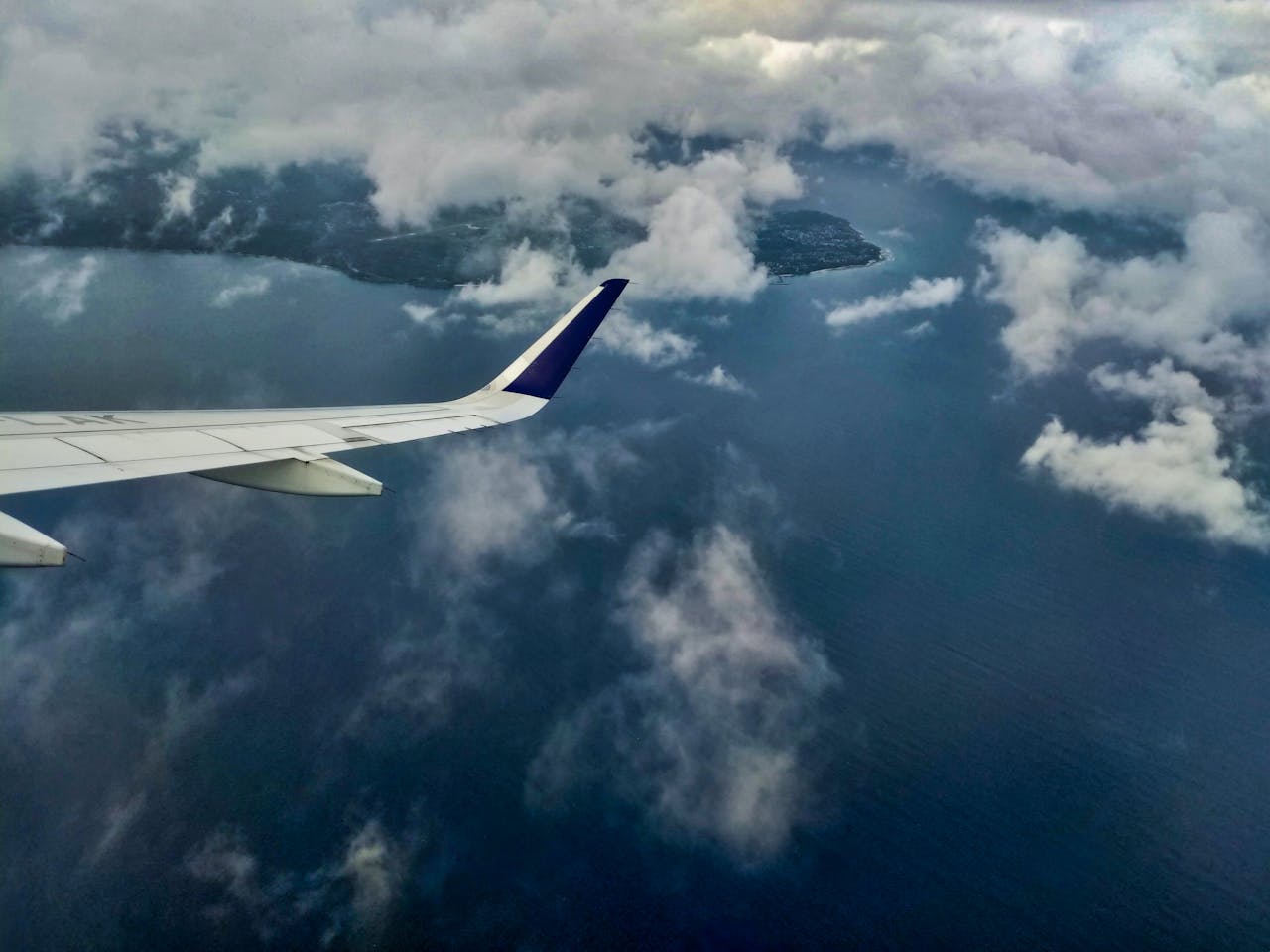 Arial photography of aircraft wing. Image by Pexels
