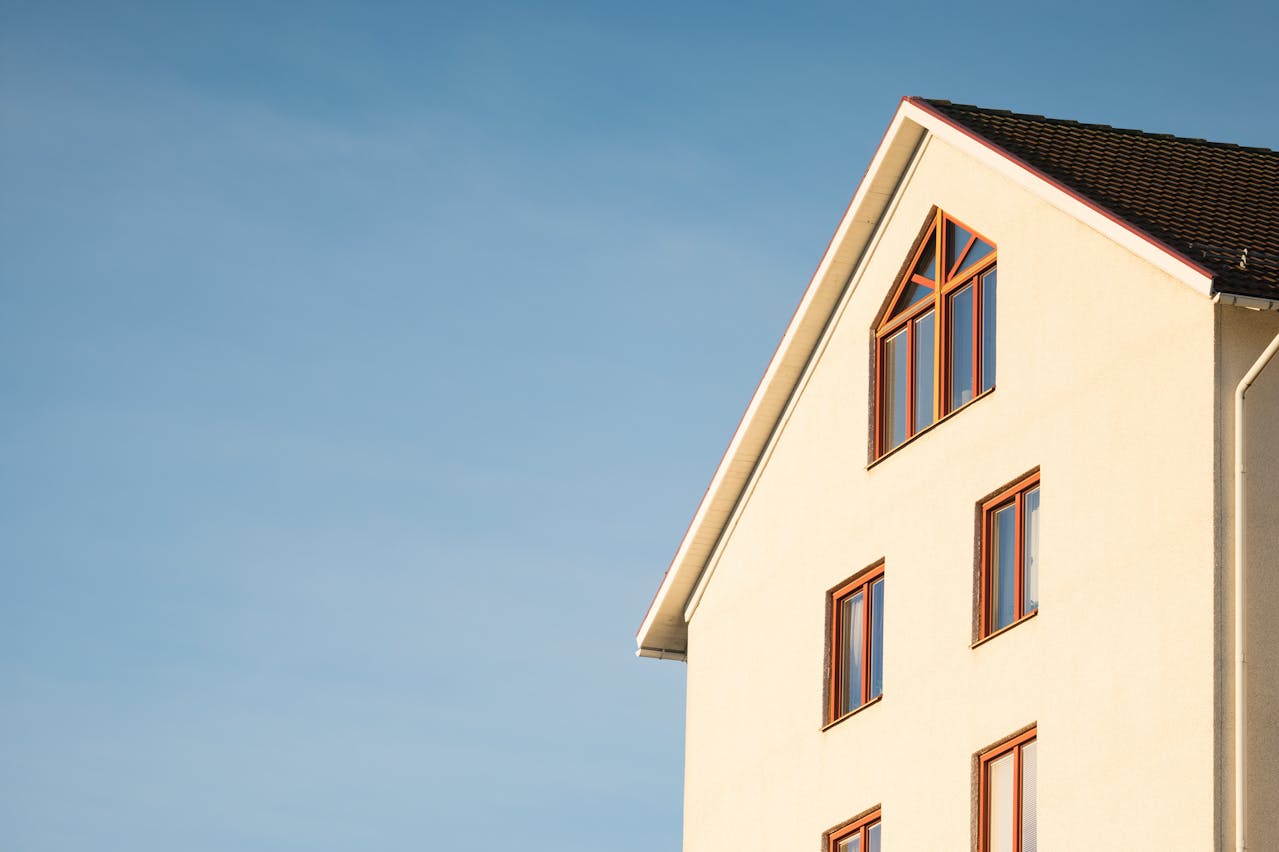 Beige house, blue sky